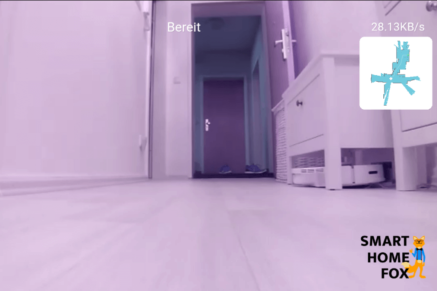 Roborock S6 MaxV показывает изображение открытой входной двери в мобильном приложении.